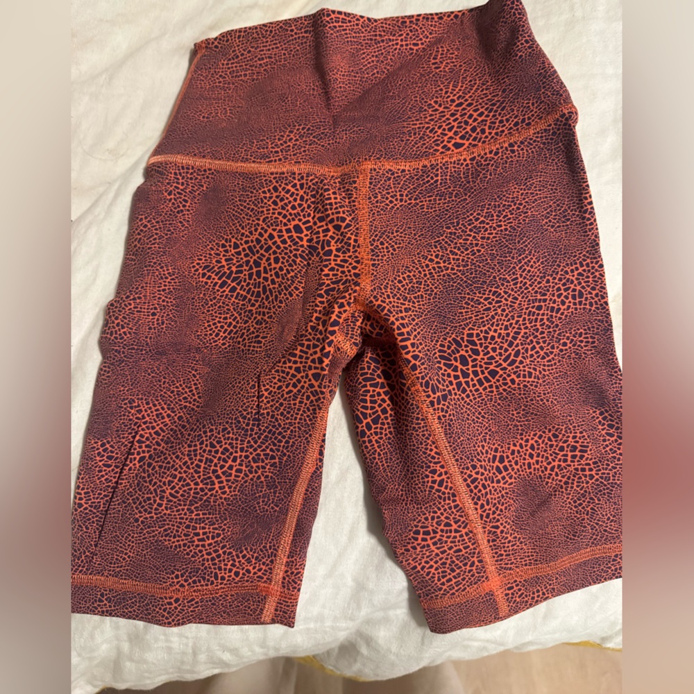 Lululemon Athletica Vibrant Orange and Black Leggings